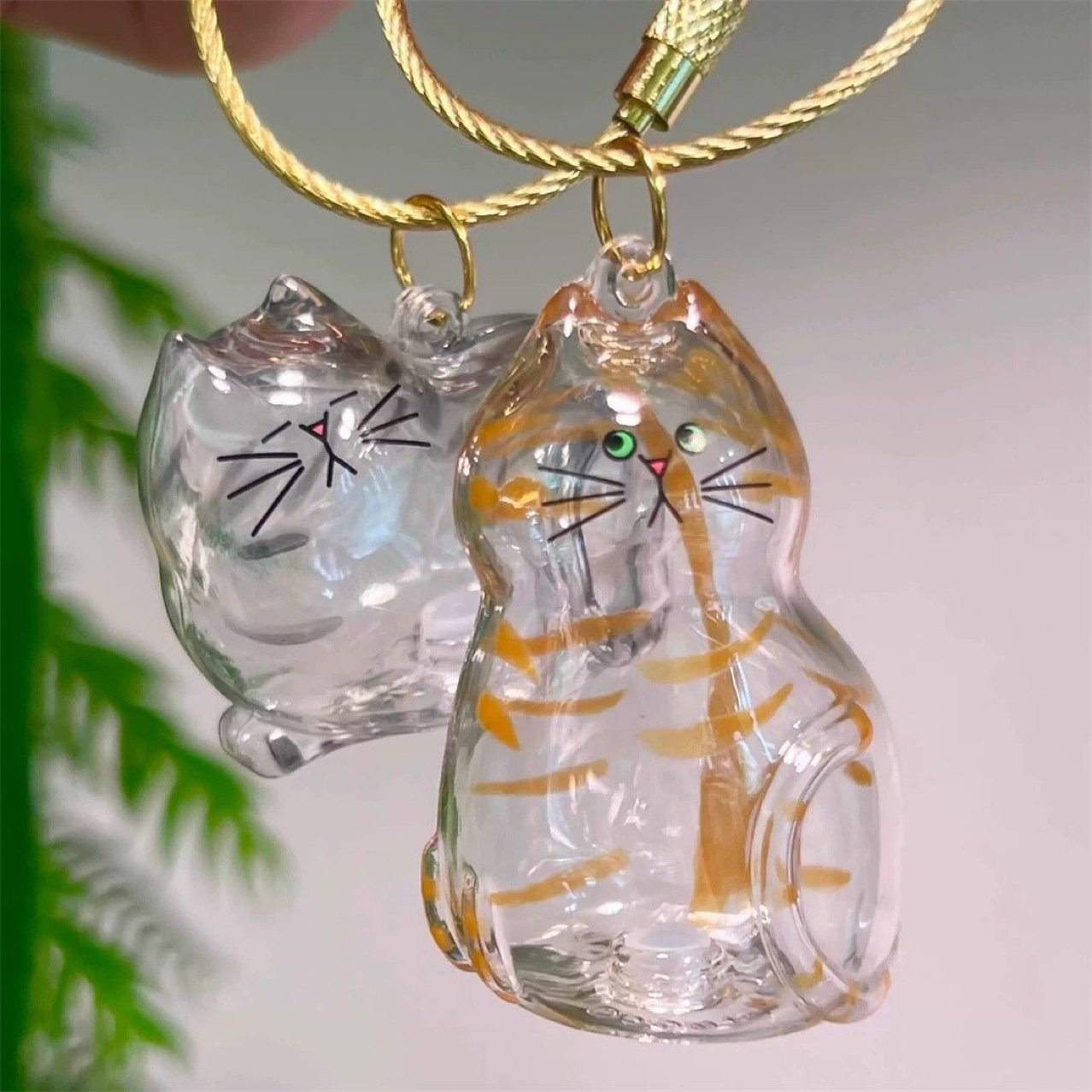 💥 Buy 1 Get 1 Free — Transparent Pet Storage Capsule Keychains 🐶 & 🐱
